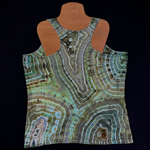 The back side of the same minty, seafoam green with earthy neutral shades geode pattern racerback ice tie dye women's tank, which features a totally different design from the front