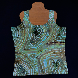 The front side of a minty, seafoam green agate geode inspired ice dyed tank top design