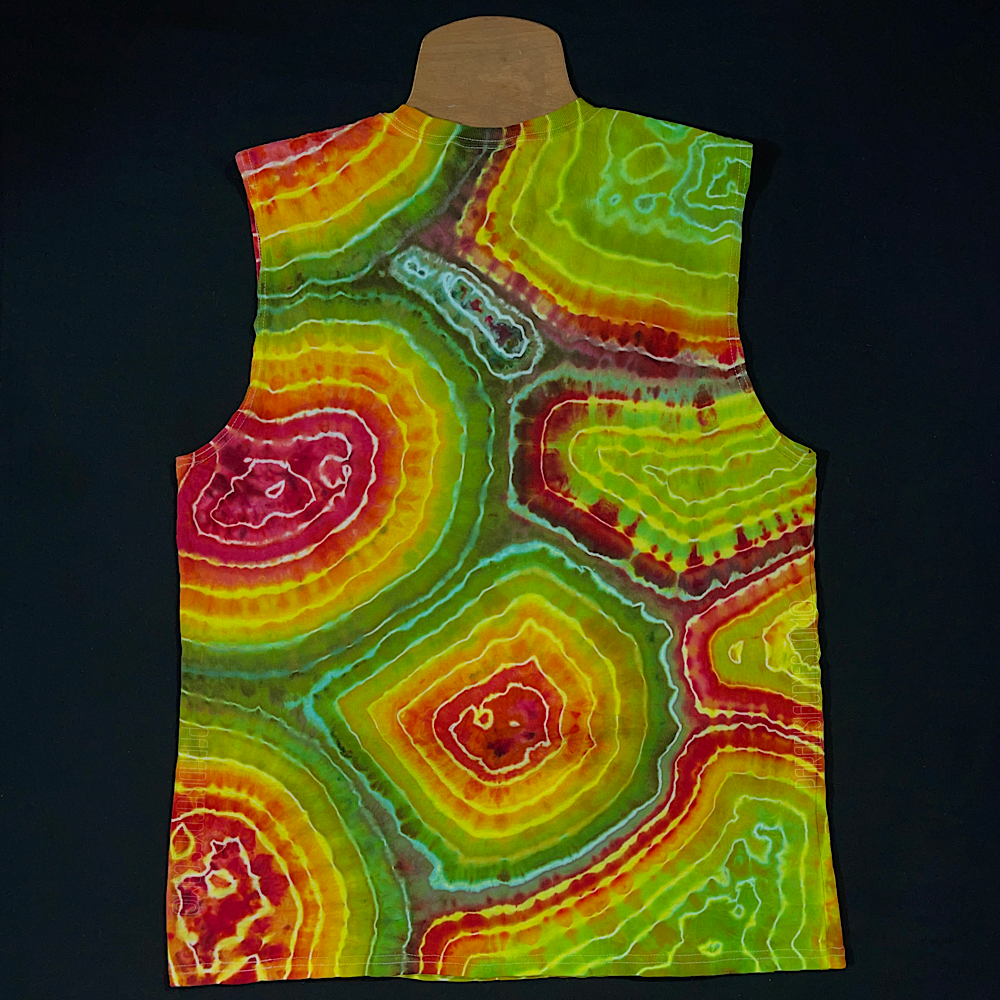 back side of a size men's large muscle style tank top in a rasta colored (red, yellow & green) agate geode ice dyed design, laid flat on a solid black background 